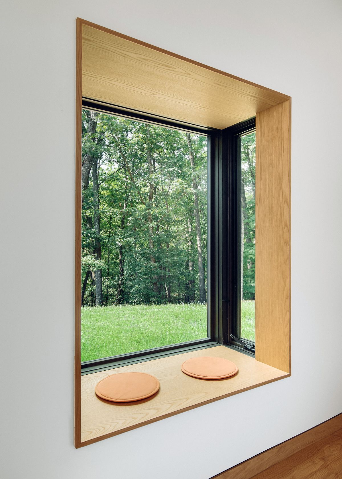 deep wood-lined window seat