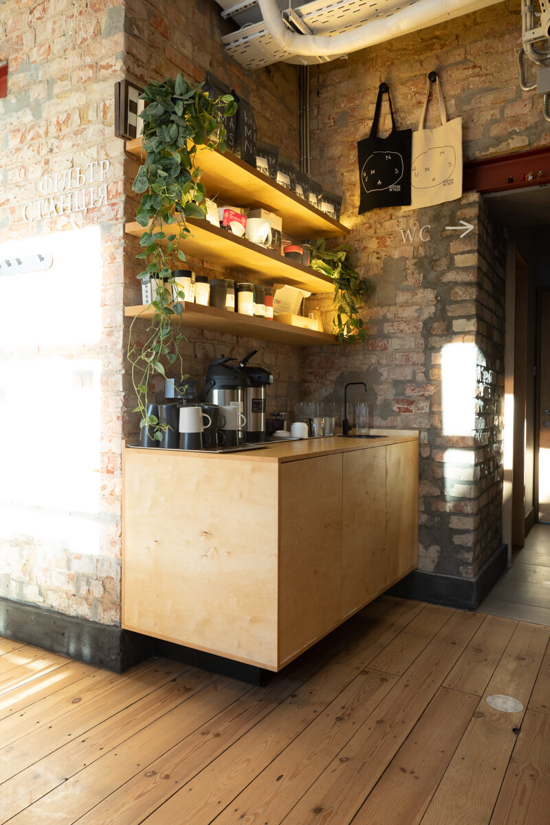 filter station alcove with plywood cabinetry and shelving