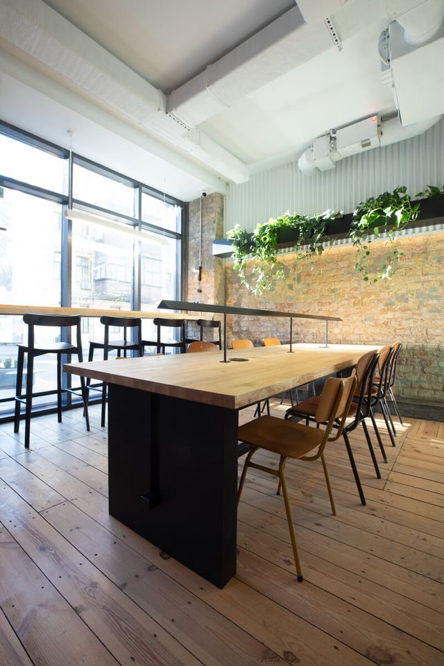 communal table with window bar counter and plant shelf