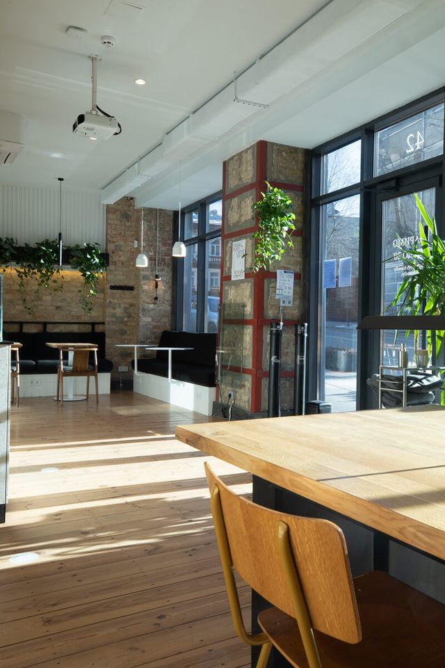 entrance zone with brick column and banquette seating
