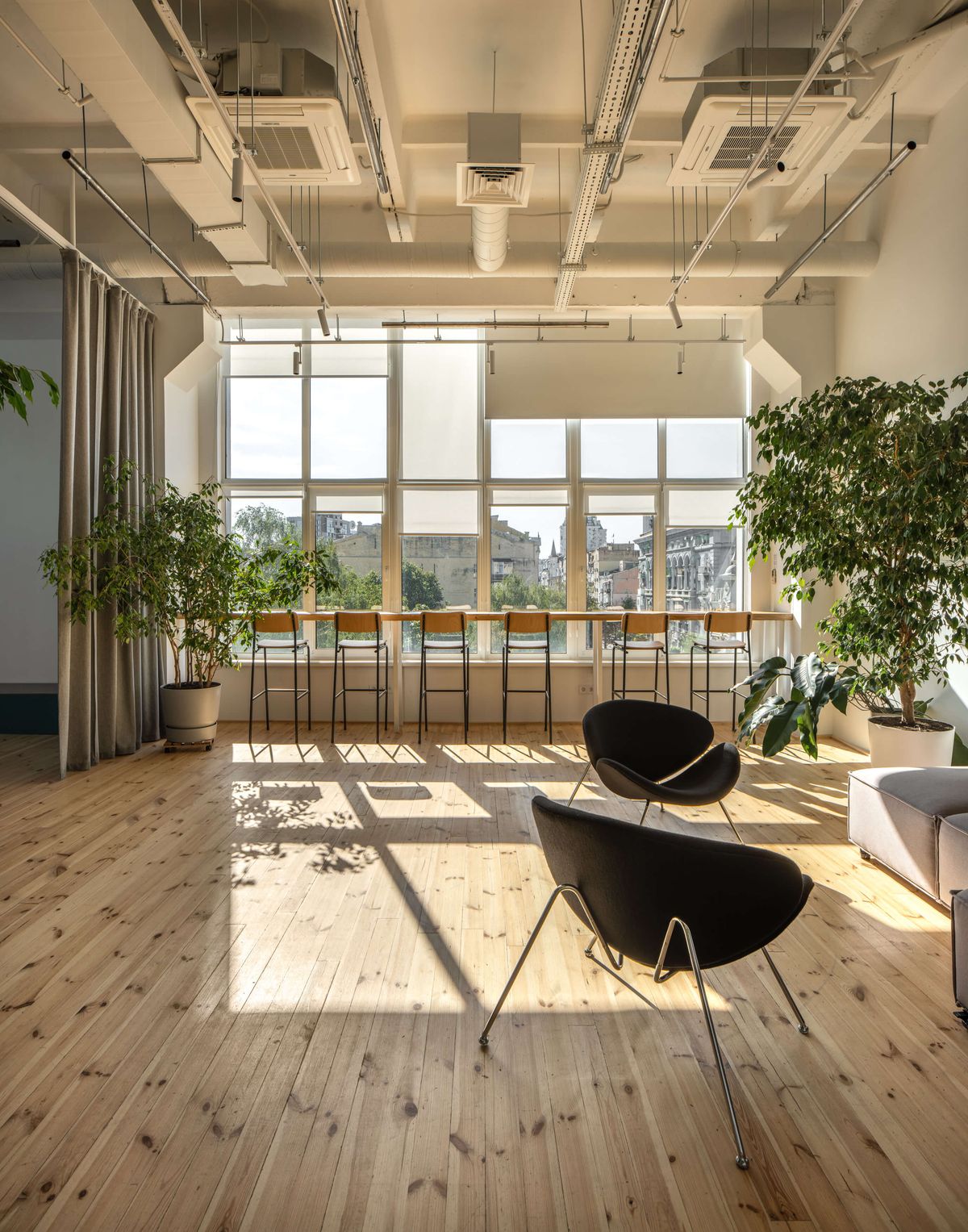 window bar counter with wooden stools in sunlight