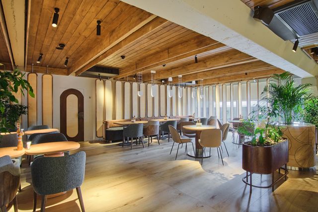 secondary dining room with timber ceiling