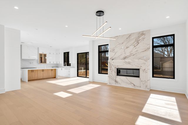 living area with marble-clad fireplace