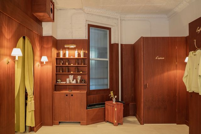 built-in wood shelving with cloakroom partition door
